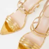 elegant gold pin heels