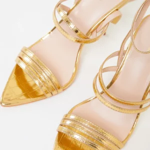 elegant gold pin heels