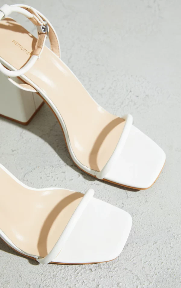 white barely there block heeled sandals